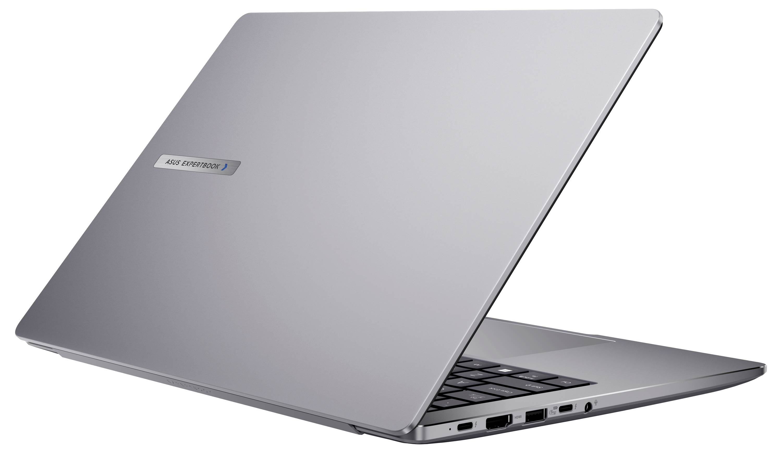 Ein eleganter, silberner Laptop, leicht aus einem Winkel dargestellt, der die Tastatur und Anschlüsse teilweise zeigt und sein modernes Design hervorhebt.