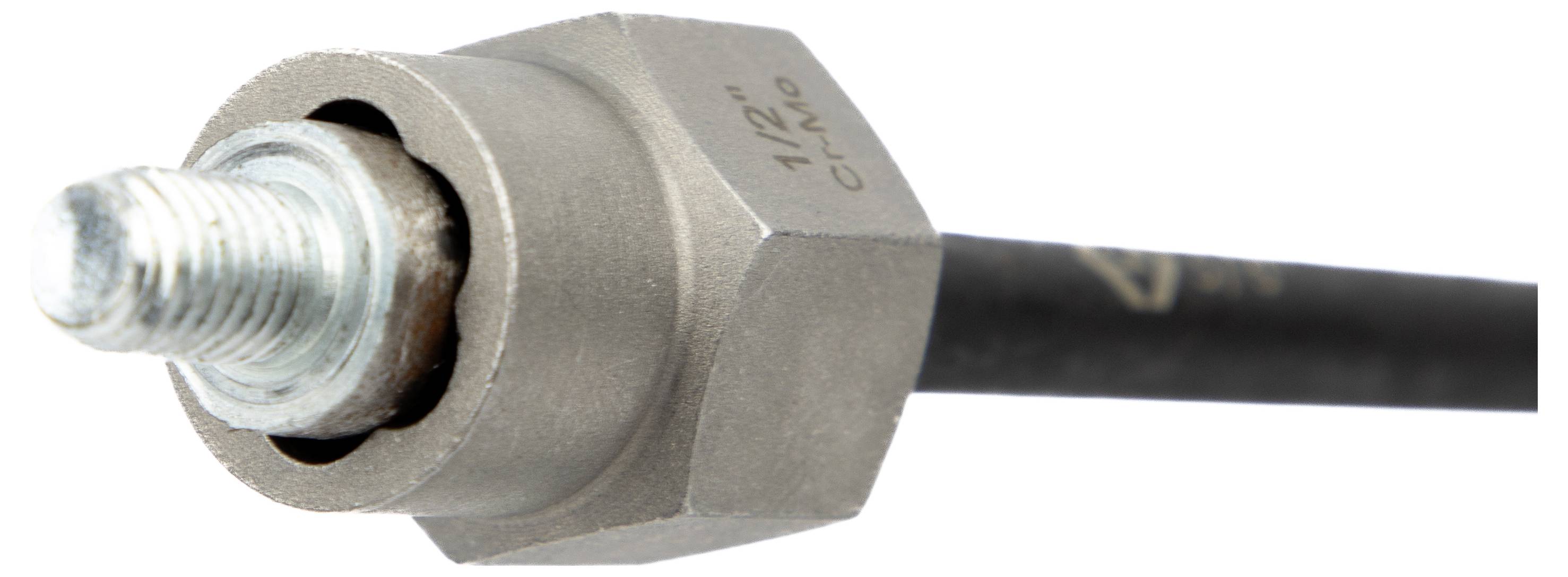 Eine Metallsechskantmutter mit der Aufschrift 