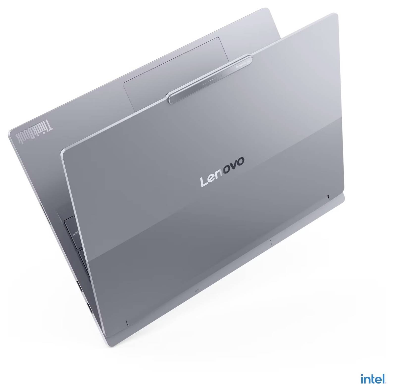Ein zugeklappter Lenovo-Laptop in metallischem Grau mit dem Lenovo-Logo.
