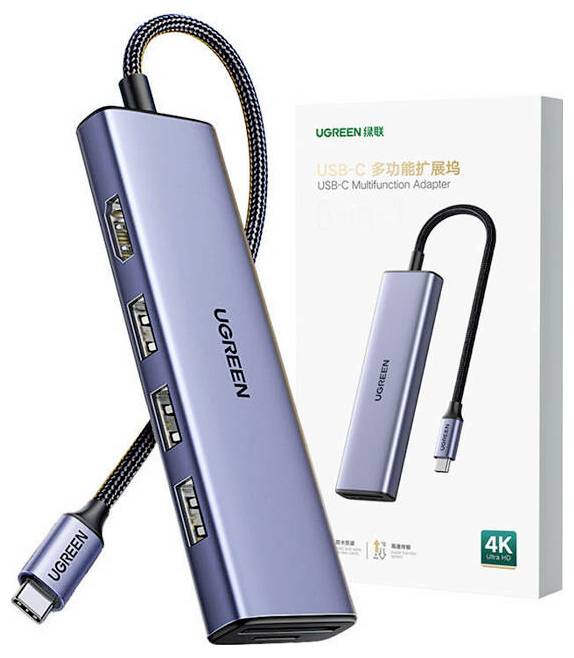 Ein eleganter USB-C-Multifunktionsadapter mit mehreren Anschlüssen wird zusammen mit seiner Verpackung angezeigt und hebt 4K-Konnektivitätsfunktionen hervor.