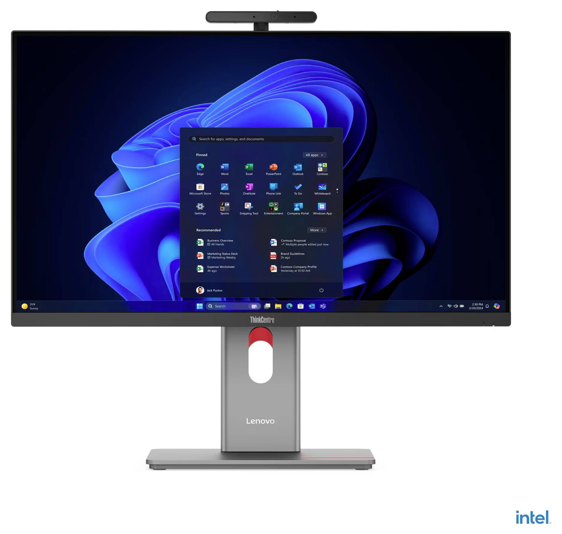 Ein Lenovo-Monitor mit einer oben angebrachten Videokonferenzkamera und einer angezeigten Windows-Betriebssystem-Oberfläche, die einen Desktop mit verschiedenen sichtbaren Anwendungssymbolen zeigt.