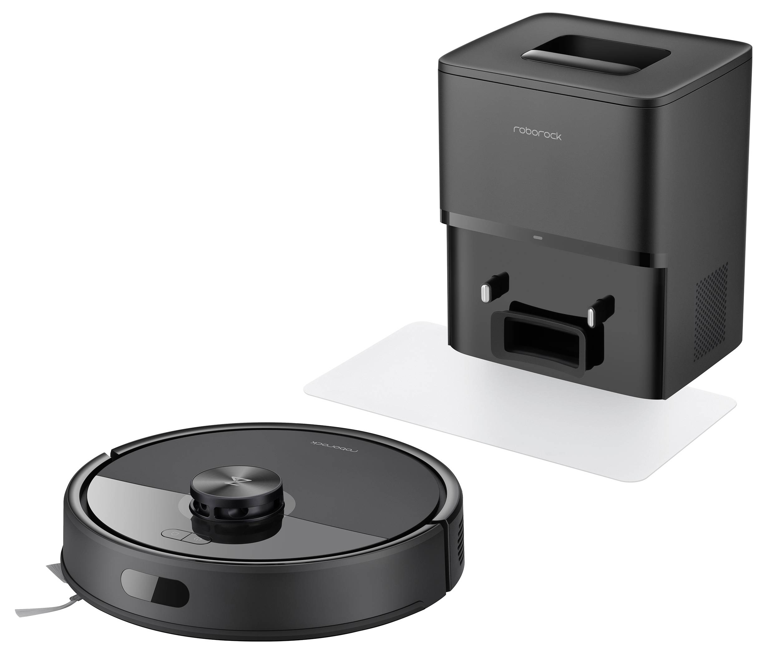 Ein Roboterstaubsauger und seine Ladestation. Der Sauger ist kreisförmig mit einer dunklen Oberfläche, und die Ladestation ist rechteckig.
