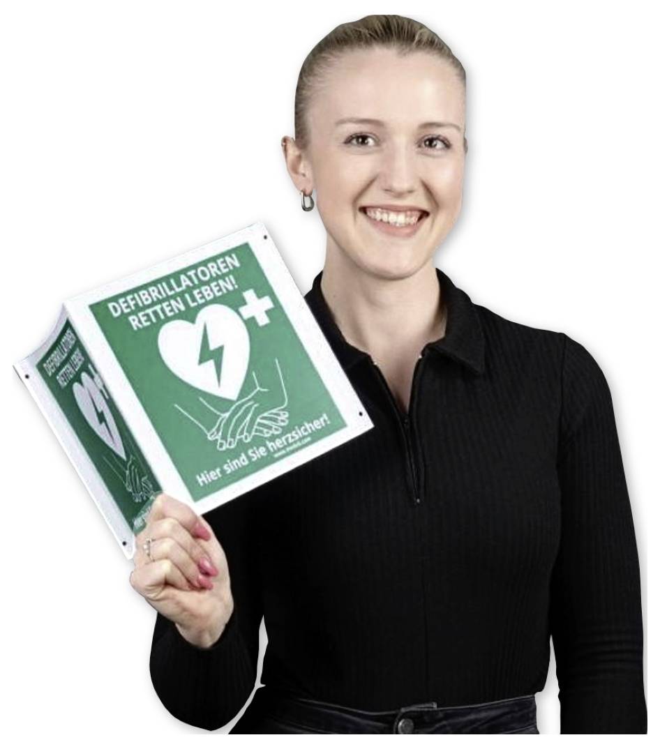 Ein automatisierter externer Defibrillator (AED) mit einer Größe von 15 cm auf jeder Seite. Bedienungsanleitung anzeigen. Primedic-Branding sichtbar.