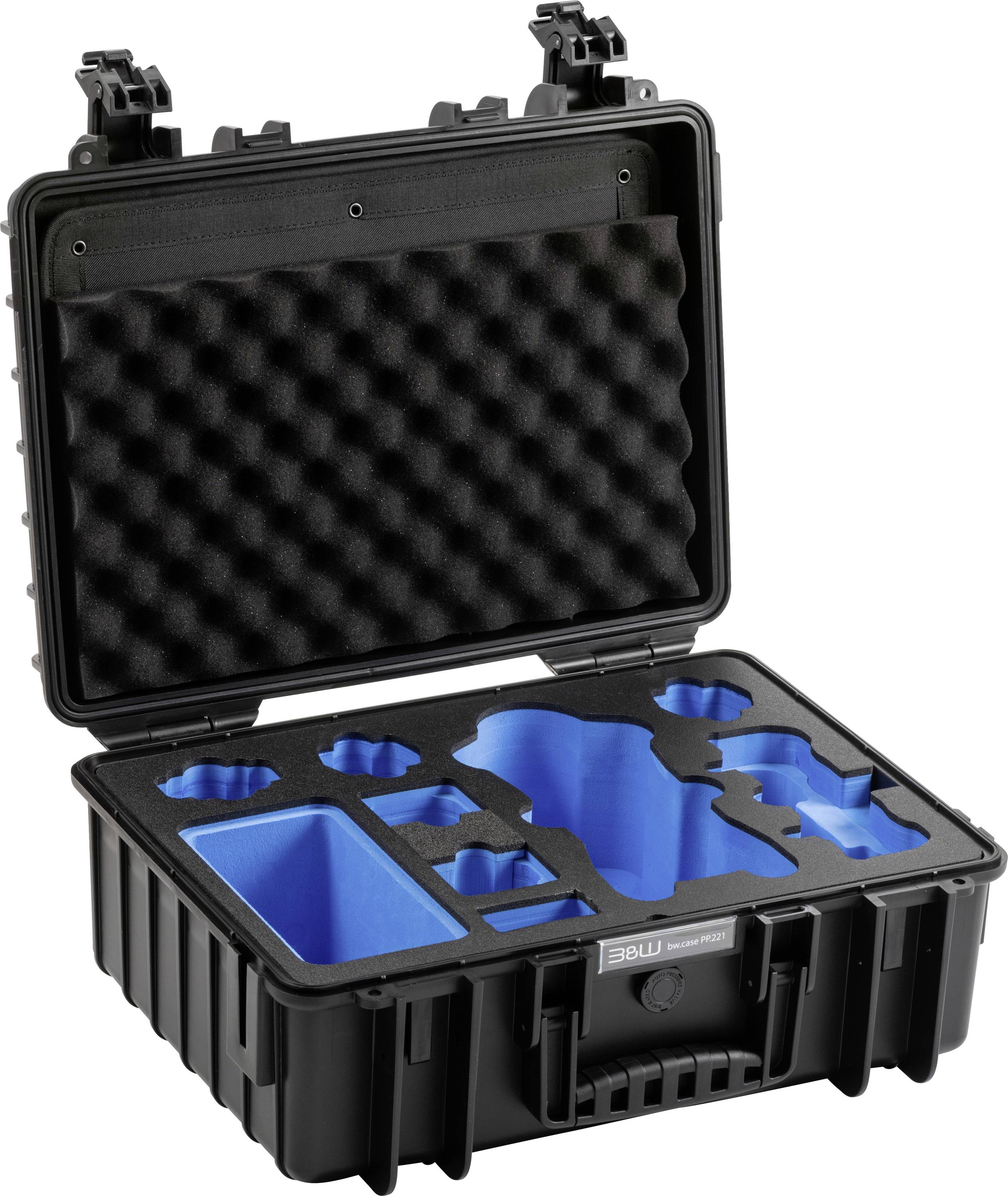 Ein schwarzer hartschaliger Koffer mit maßgefertigten blauen Schaumstoffeinlagen bietet schützende Fächer für verschiedengroße Objekte.
