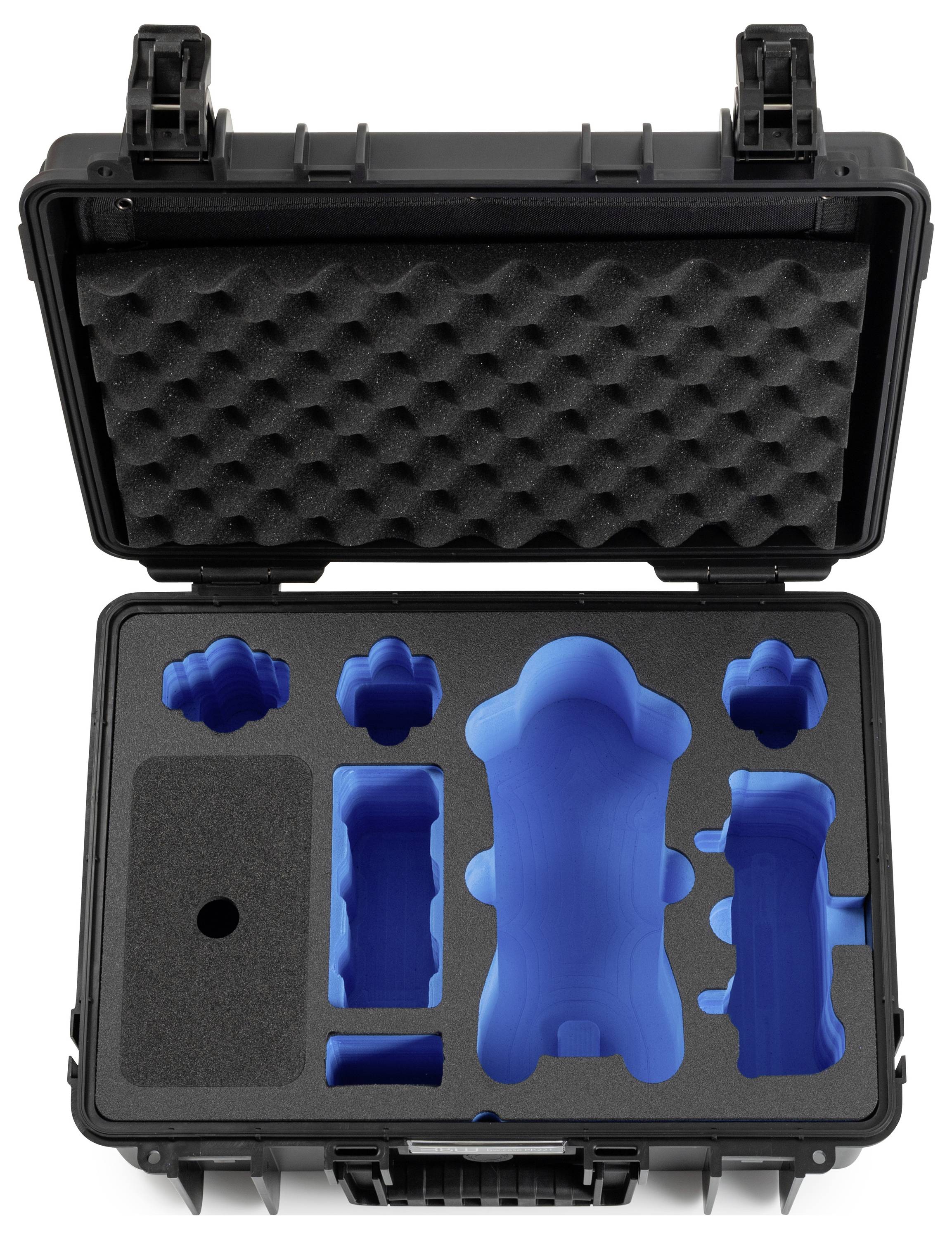 Ein offener schwarzer Schutzkoffer mit maßgefertigten blauen Schaumstoff-Einsätzen in verschiedenen Formen zur Sicherung empfindlicher Gegenstände, was sichere Lagerung anzeigt.