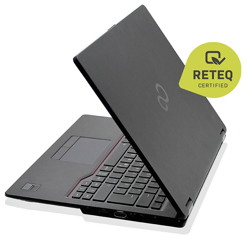 Ein schwarzer Laptop, der teilweise geöffnet ist und ein Abzeichen 