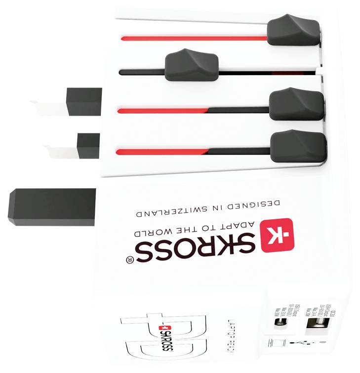 Universeller Reiseadapter mit verstellbaren Kontakten. Verfügt über zwei USB-Anschlüsse und ein elegantes, kompaktes Design. Der Text lautet „SKROSS - Adapt to the World