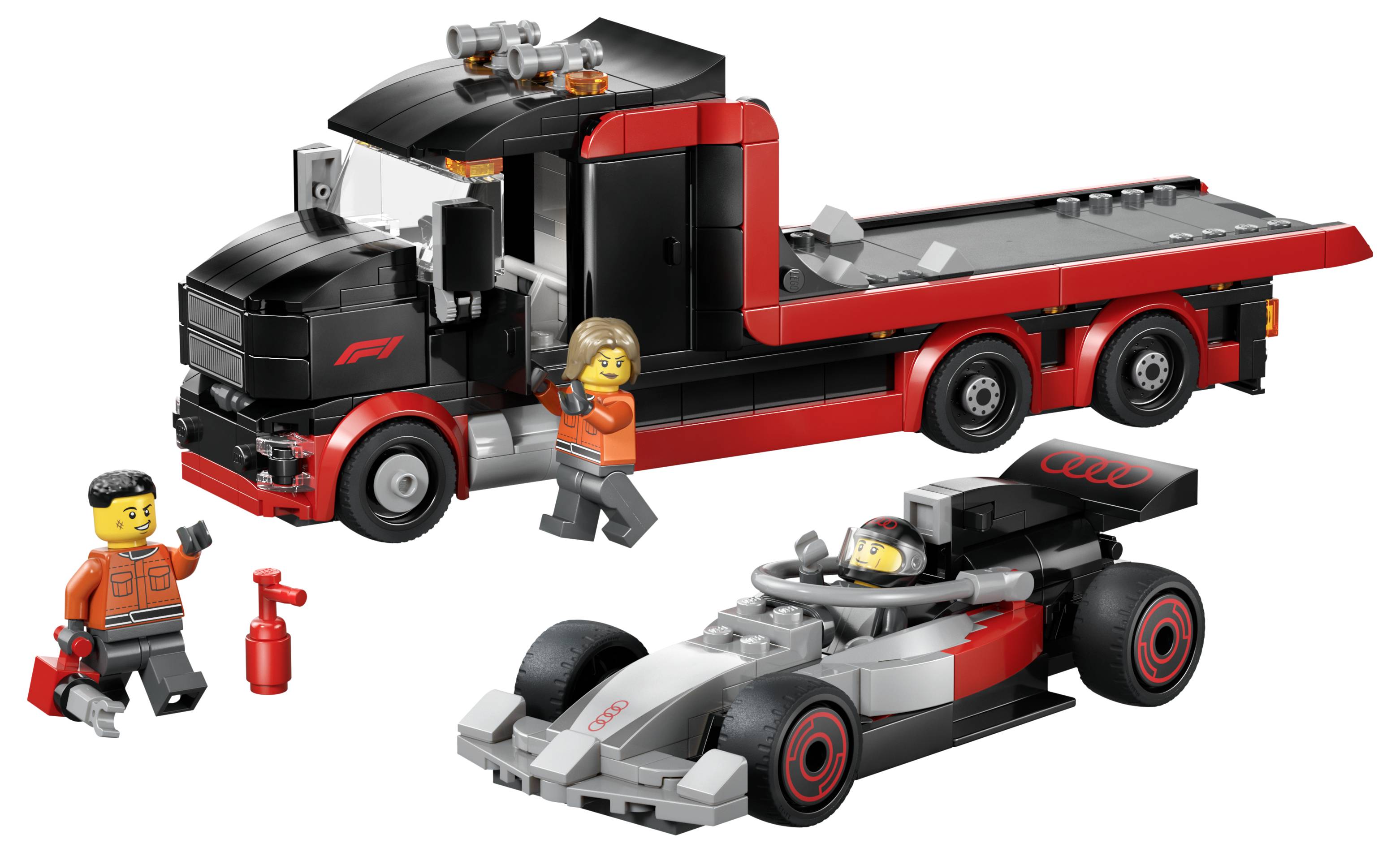 Ein Spielzeugset mit einem schwarz-rot lackierten Transportlastwagen, einem Rennwagen und zwei Spielzeugfiguren mit einem Schraubenschlüssel und einem Feuerlöscher.