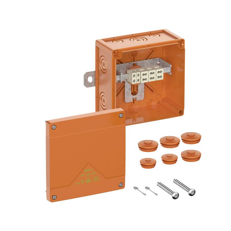 Orange-farbiger elektrischer Verteilkasten mit transparentem Deckel, Klemmleiste und daneben angeordneten mitgelieferten Schrauben und Dübeln.