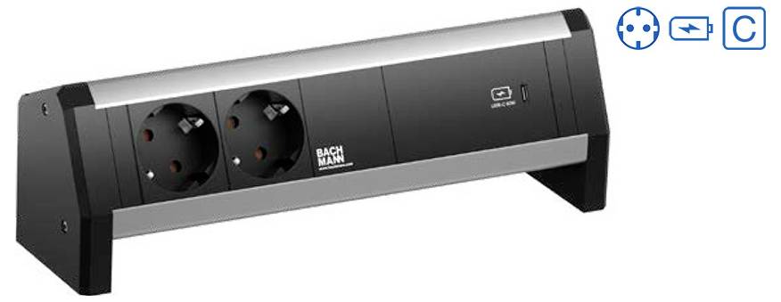 Eine Steckdosenleiste mit zwei europäischen Steckdosen und einem USB-Ladegerät, in einem Winkel angebracht.