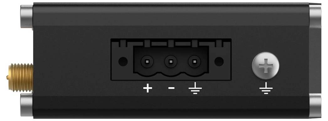 „DC-Strommodul mit Stecker und Schraubklemme. Mit Beschriftungen für positive (+), negative (-) und Erdung (⏚) Symbole zur Verdrahtungsorientierung gekennzeichnet.