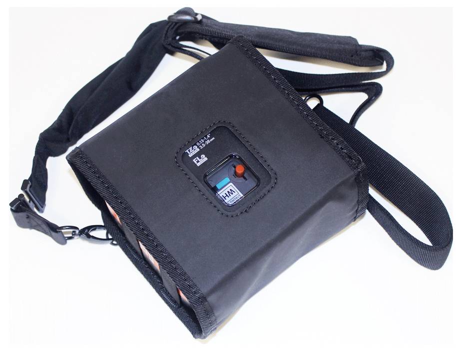 Ein schwarzes Gerät mit Riemen und einem Anzeigefeld, das einen Umschalter mit den Beschriftungen „Kiln