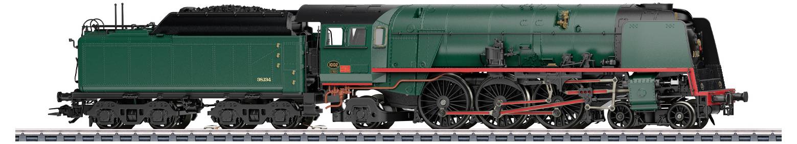 Eine grüne Dampflokomotive mit roten Details und schwarzen Akzenten zur Schau gestellt, die klassisches Konstruktionsdesign zeigt.