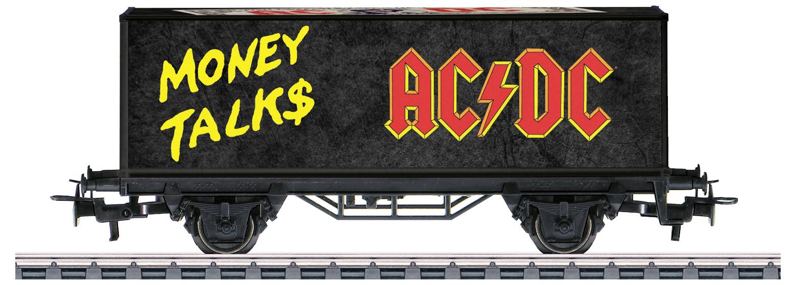 Ein Eisenbahnwagen auf Gleisen zeigt „Money Talk$