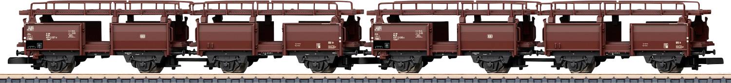 Eine Reihe von roten Vintage-Güterwagen mit offenen Seiten, die auf einem Eisenbahngleis gezeigt werden, wobei historische Beförderung betont wird.