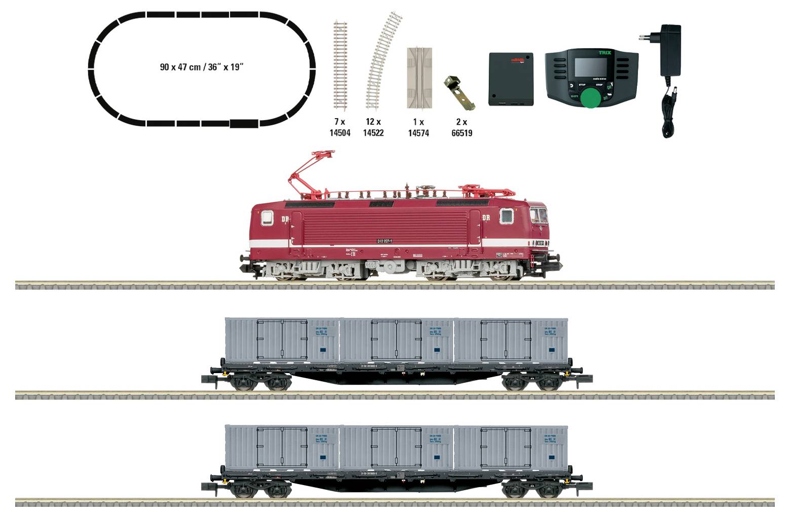 Modelleisenbahnanlage mit einer ovalen Strecke, Zubehör, einer roten elektrischen Lokomotive und zwei grauen Güterwagen auf geraden Gleisabschnitten.