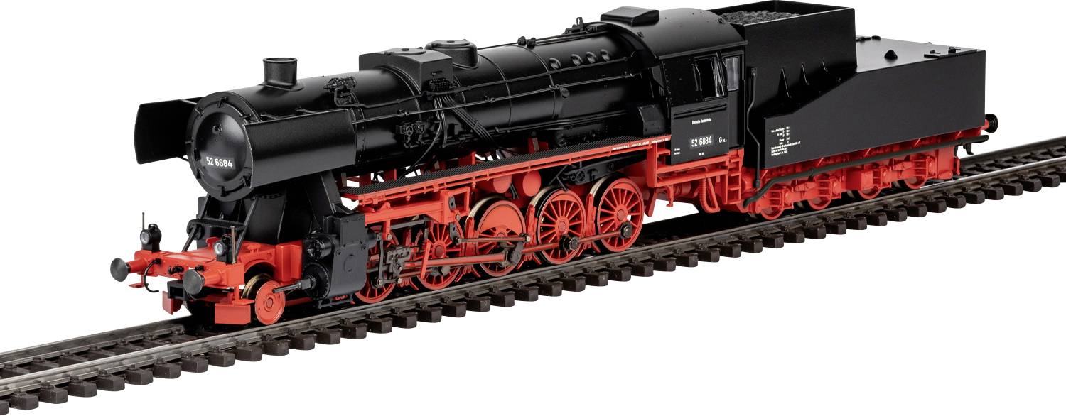 Ein Modell einer schwarzen und roten Dampflokomotive auf Schienen, das aufwendige mechanische Details und klassische Designelemente zur Schau stellt.