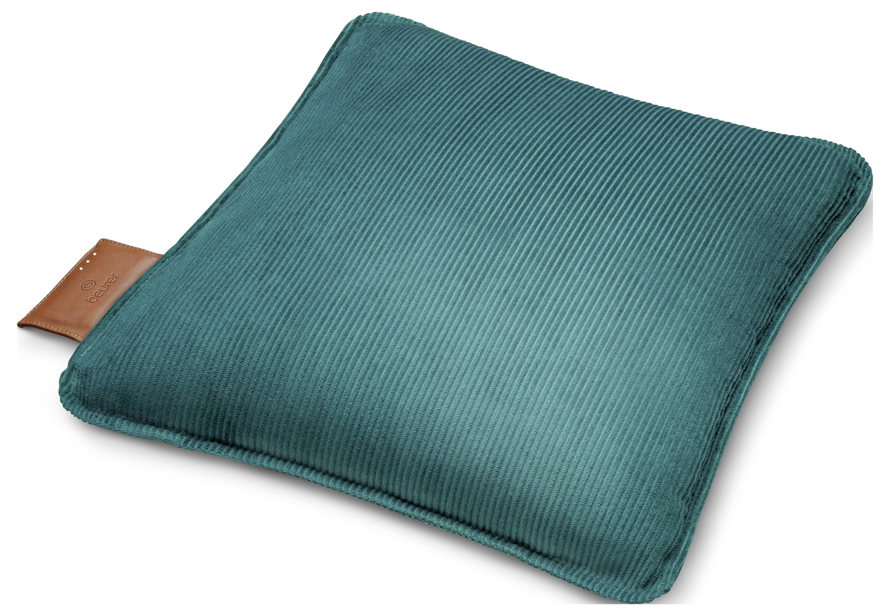 Ein tealharbenes quadratisches Kissen mit einer gerippten Struktur und einem braunen Lederanhänger auf einer Seite.