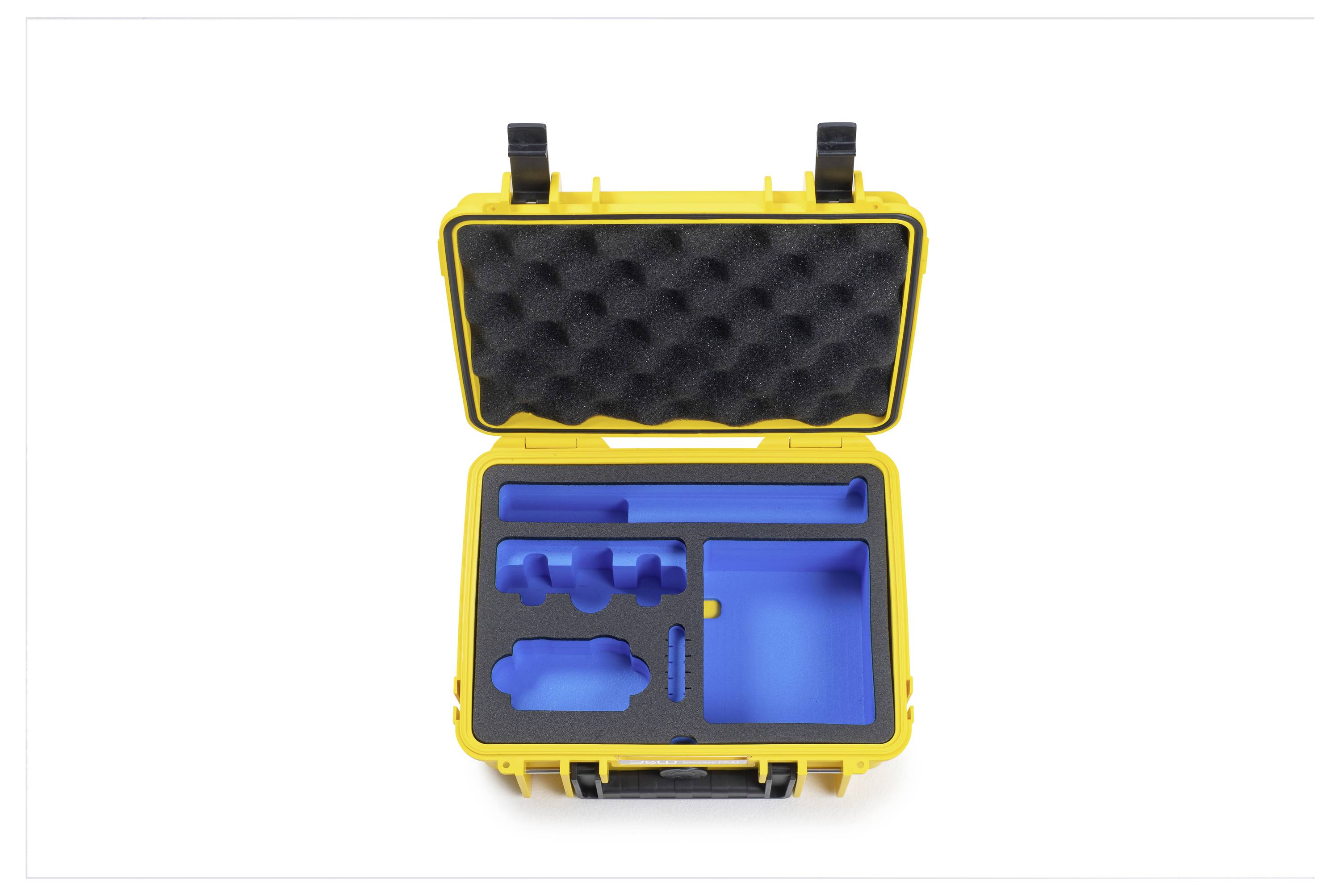 Offener gelber Transportkoffer mit Schaumstoffinnenseite, der verschiedene Fächer zur Organisierung von Werkzeugen oder Ausrüstung zeigt.