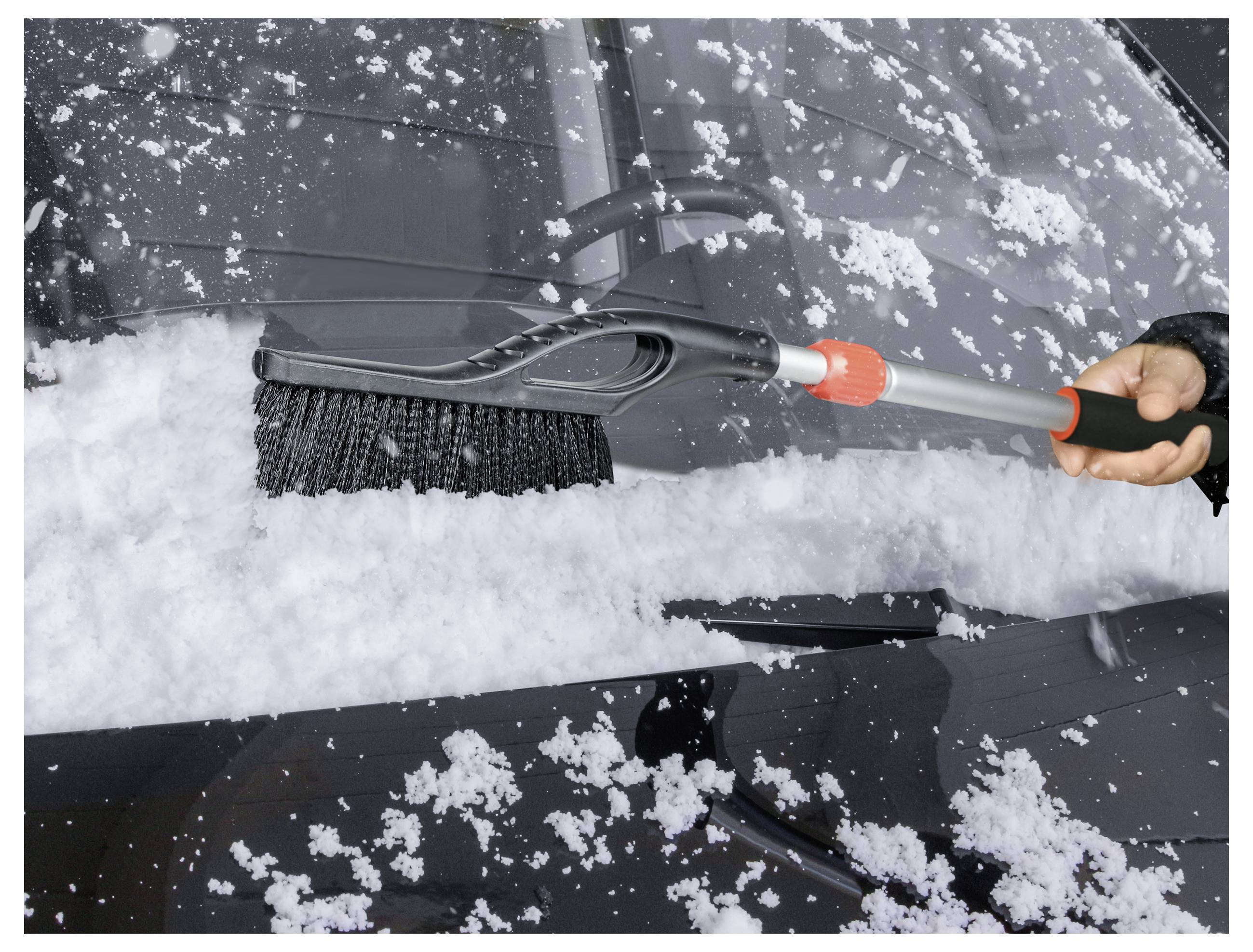 Schwarze kreisförmige industrielle Deckenleuchte mit sichtbarer Verkabelung und Etikett auf der Unterseite, von unten betrachtet.