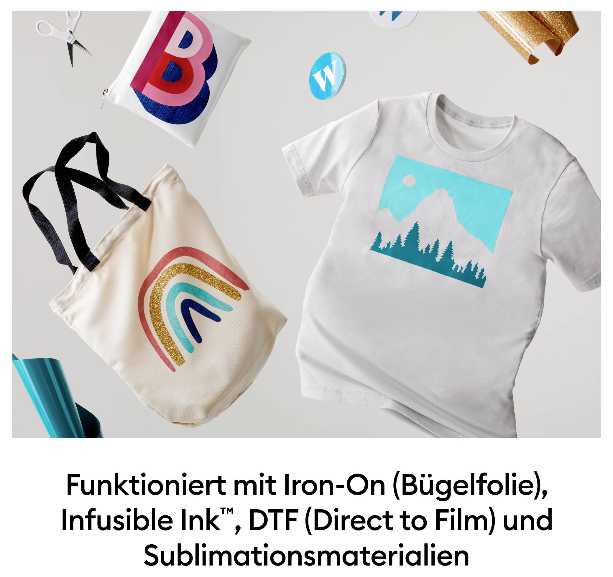 Tasche mit Regenbogenmotiv und T-Shirt mit Bergdesign, Text: 'Funktioniert mit Iron-On, Infusible Ink™, DTF und Sublimationsmaterialien'.