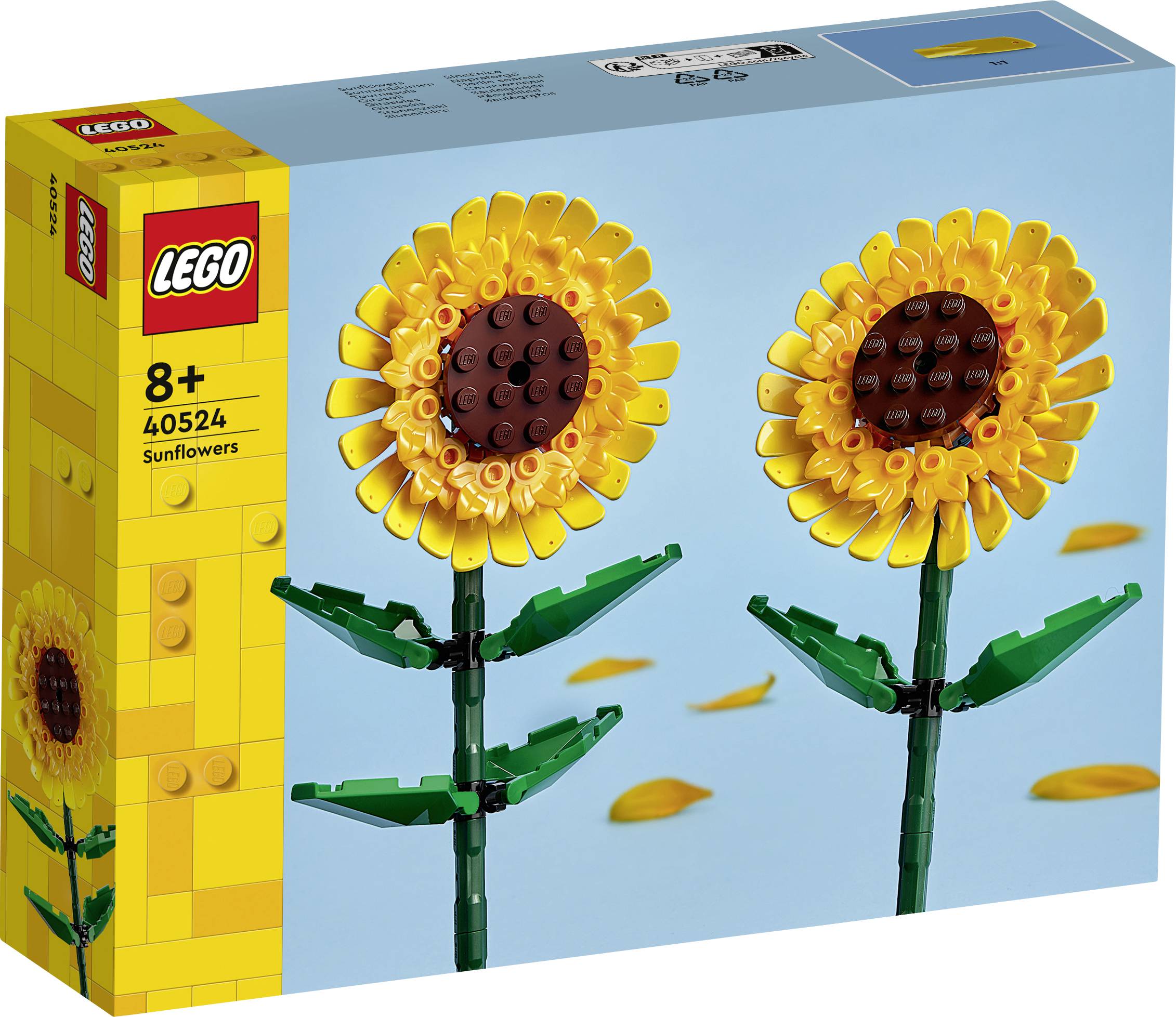 LEGO-Set mit zwei Sonnenblumen aus Steinen vor blauem Hintergrund, geeignet für Altersgruppen ab 8 Jahren.