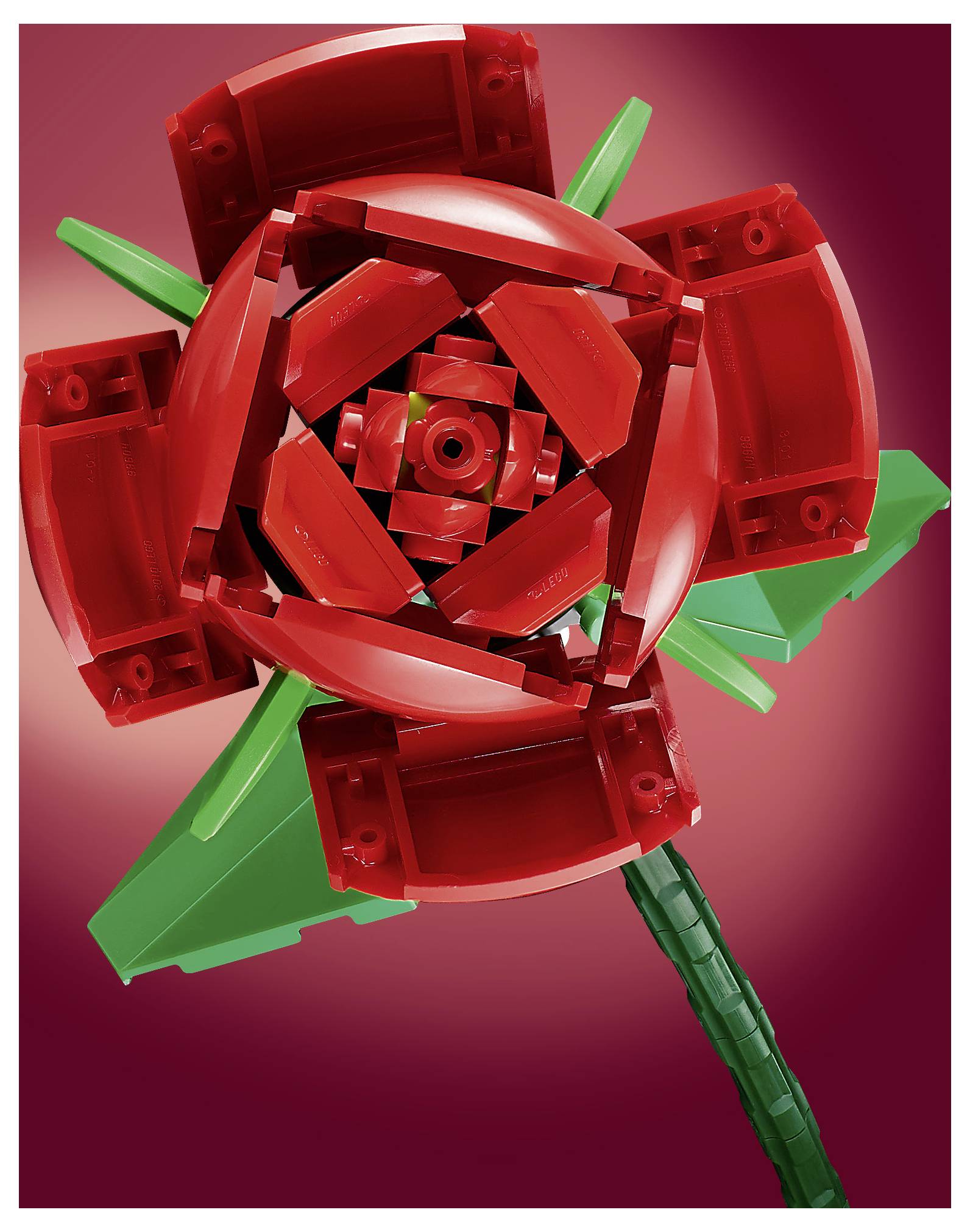 Eine rote LEGO-Blume mit grünen Blättern vor einem roten Farbverlaufshintergrund.