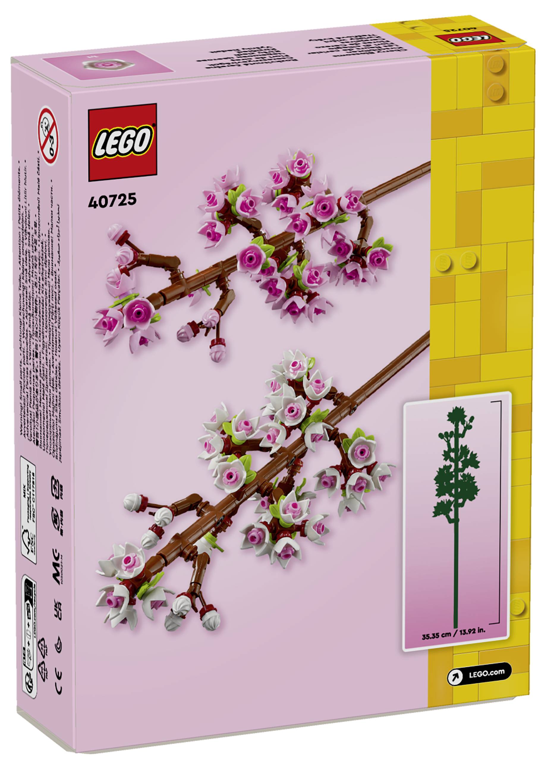 LEGO-Set-Karton mit Kirschblütenzweigen vor rosa Hintergrund, Modellnummer 40725, zeigt aufwändige Blütendetails.