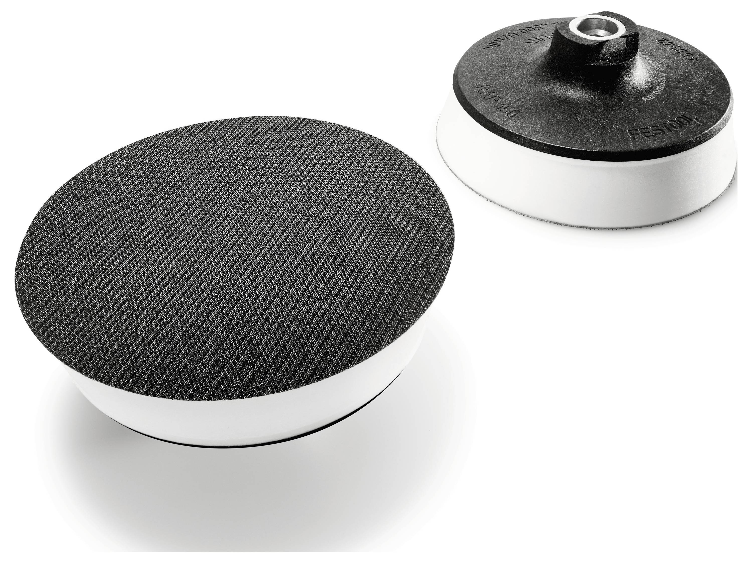 Eine Klapptischkreissäge mit ausziehbarer Oberfläche, ausgestattet mit einem grünen Absaugschlauch zur Staubabsaugung.