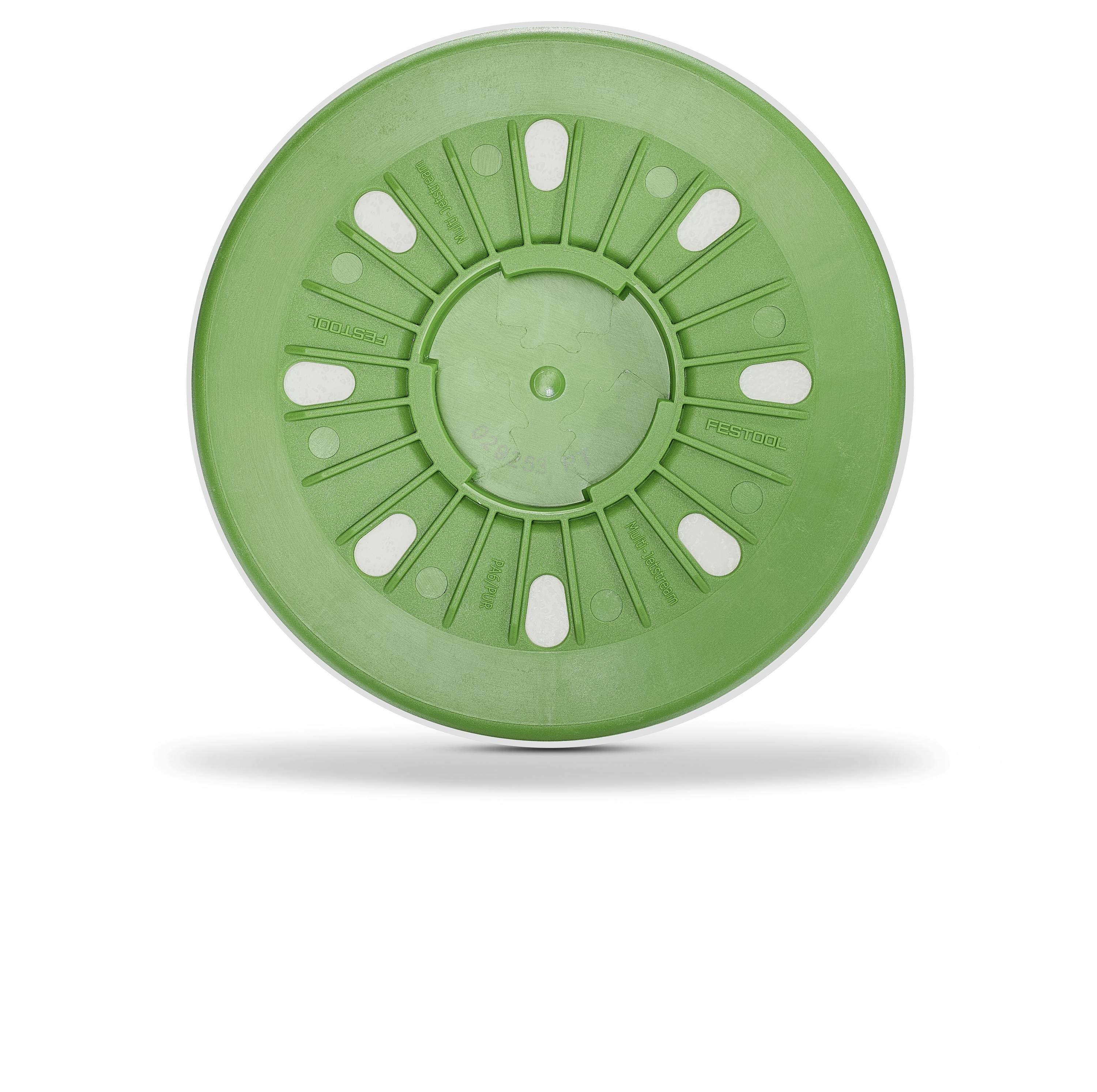 Eine grüne Kunststoffscheibe mit einem kreisförmigen Design und mehreren Öffnungen, die als Deckel oder Abdeckung verwendet wird.