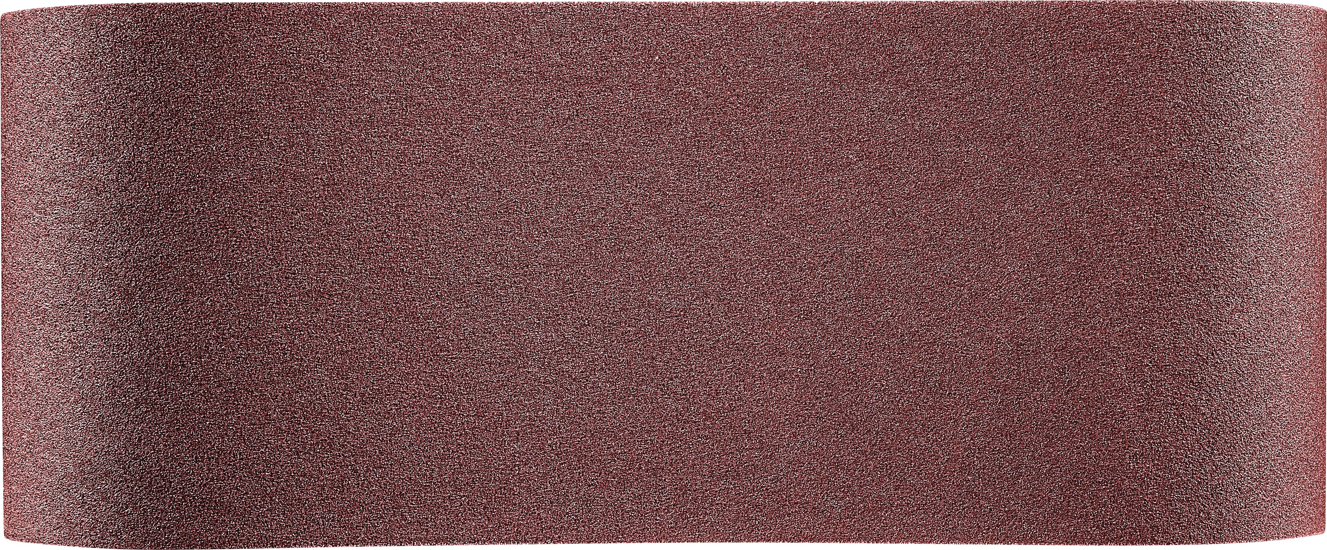 Ein Nahaufnahmebild eines braunen Schleifbandes, das seine strukturierte Schleiffläche zeigt und zum Glätten oder Polieren von Materialien verwendet wird.