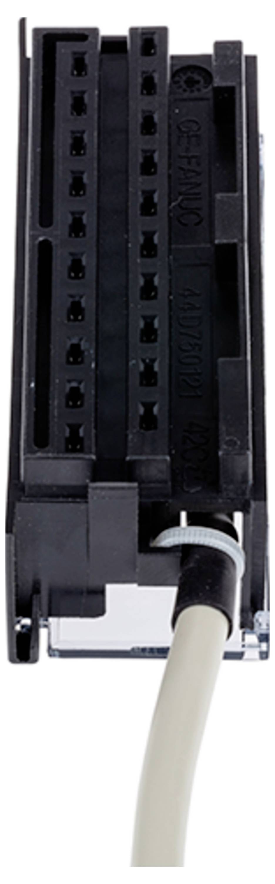 Eine Nahaufnahme eines rechteckigen elektronischen Steckers mit einem beigefarbenen Kabel, das für die Daten- oder Stromübertragung in verschiedenen Geräten verwendet wird.