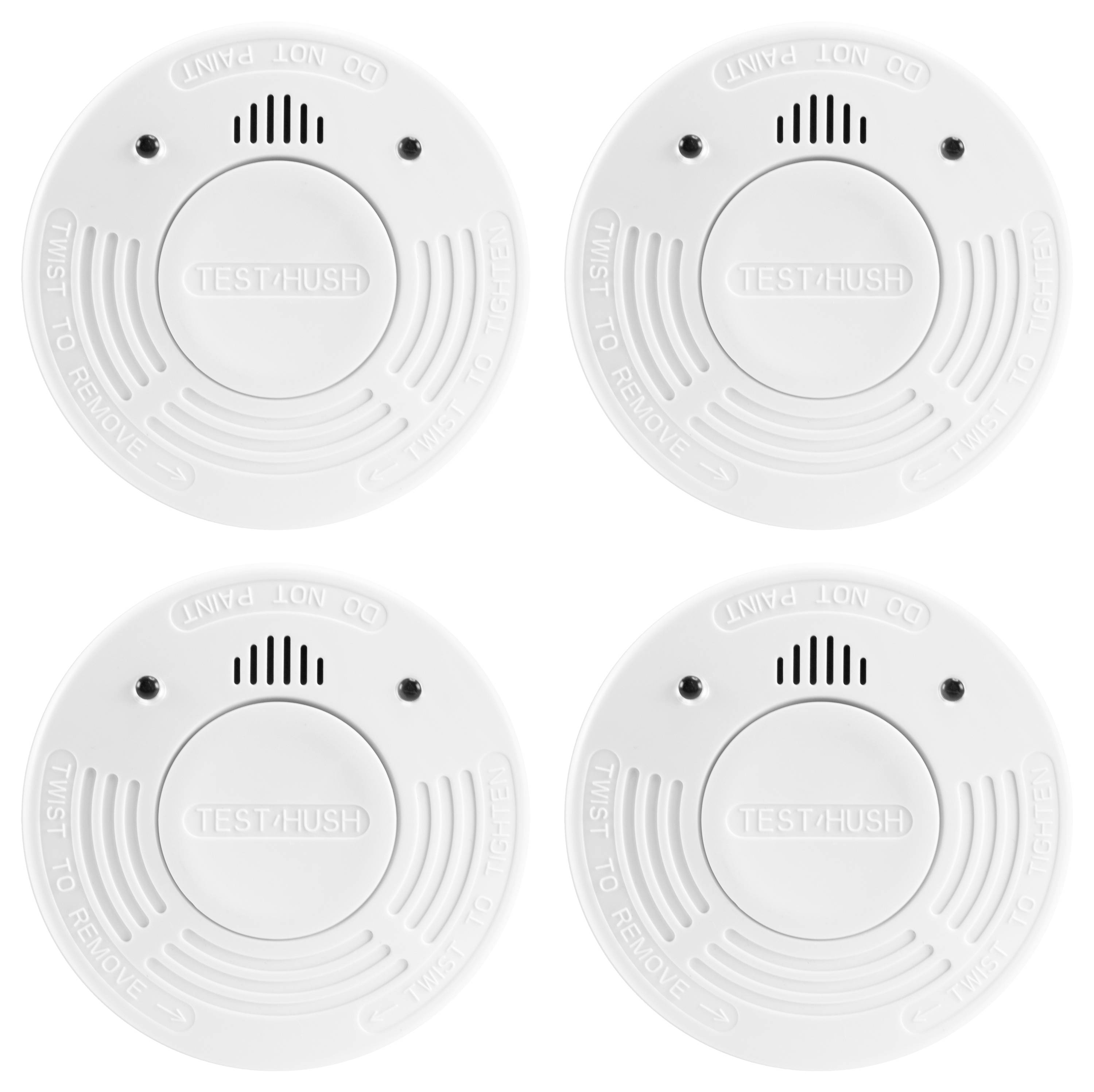 Vier weiße Rauchmelder mit „TEST/HUSH