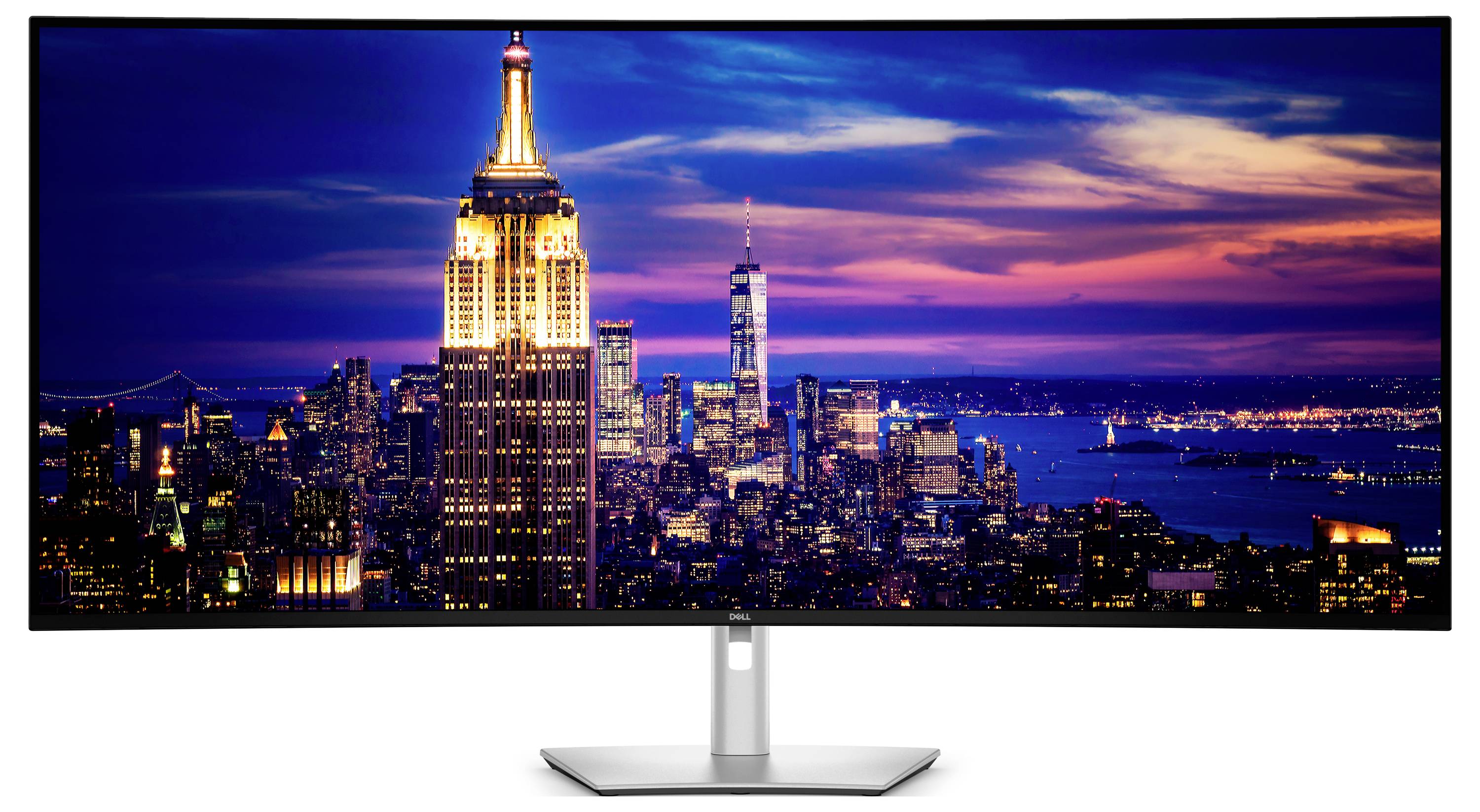 Eine Stadtlandschaft in der Dämmerung, die eine beleuchtete Skyline mit Wolkenkratzern zeigt, einschließlich eines prominenten leuchtenden Turms gegen einen lebendigen, farbenfrohen Himmel.