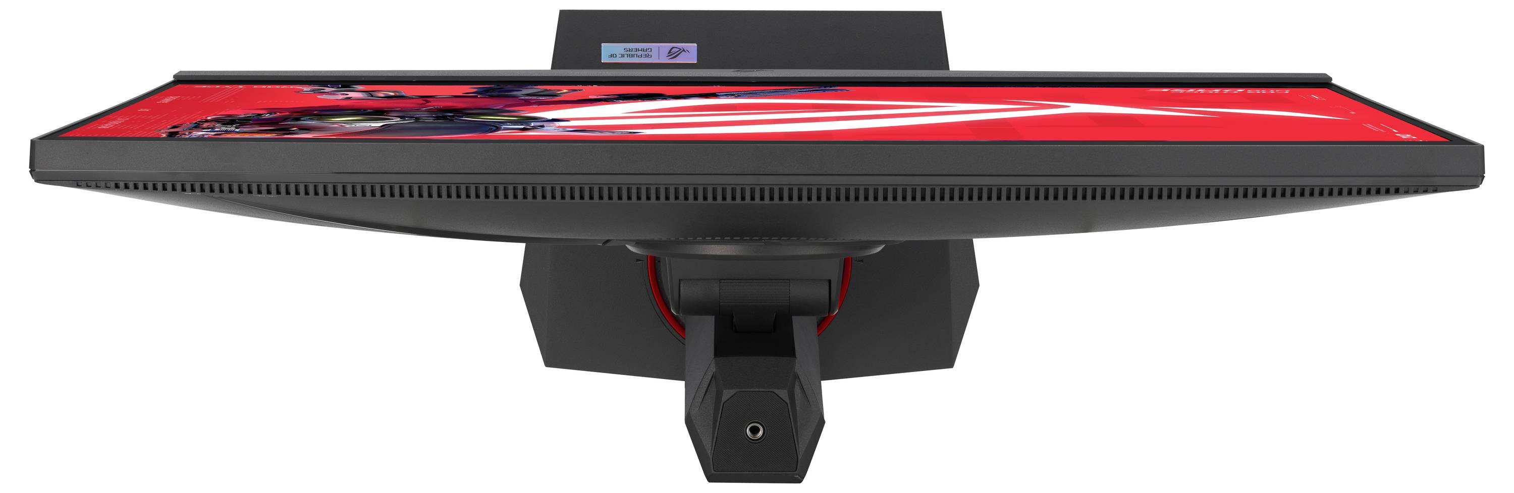 Ein schwarzer Computer-Monitor mit schlankem Design wird von oben betrachtet. Der Bildschirm zeigt ein Bild mit leuchtend roten und schwarzen Farben.