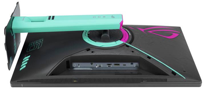 Gaming-Monitor Rückansicht mit Teal- und Pink-Design, mit Anschlussanschlüssen wie HDMI und USB und lebhaften Branding-Details.