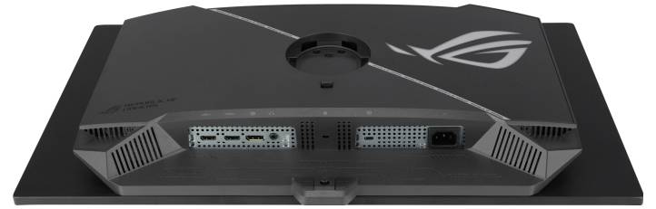 Das Bild zeigt die Rückseite eines Monitors mit dem ROG-Logo, mit mehreren Anschlüssen einschließlich HDMI, DisplayPort und einer Stromeingangsverbindung.