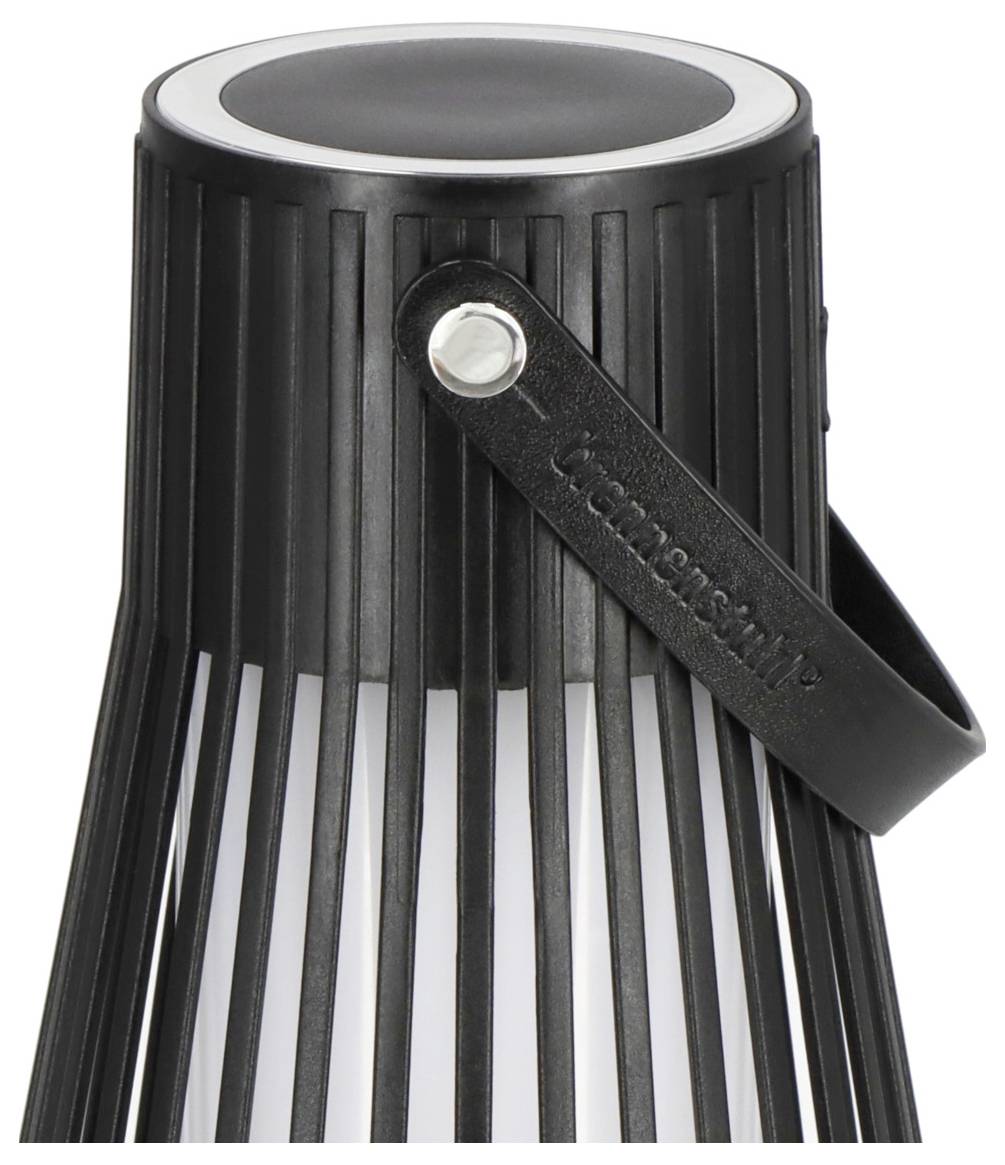 Eine schwarze, vertikal gestreifte Außenlaterne mit Griff, die ein modernes Design zur Schau stellt.