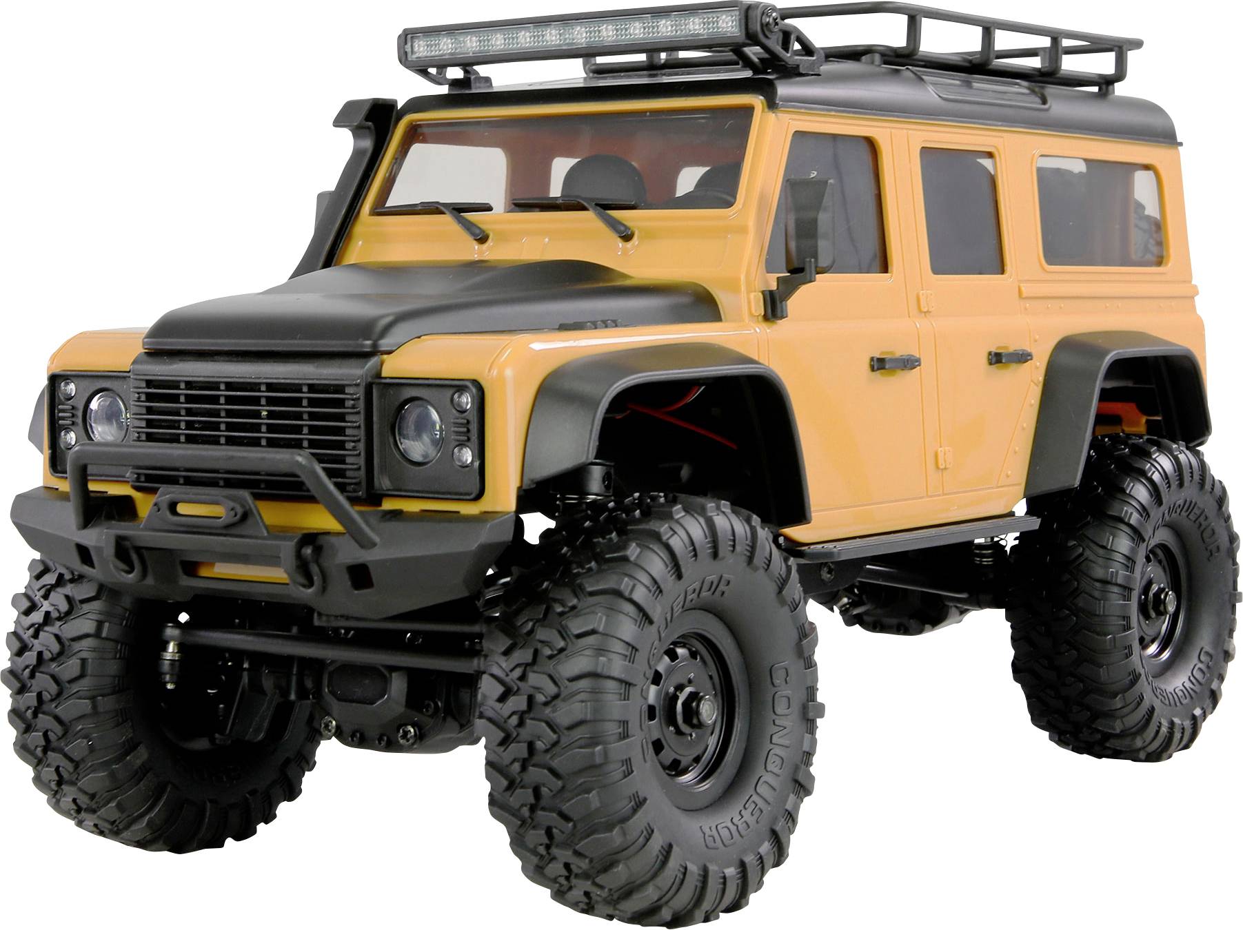 „Gelbes und schwarzes Geländefahrzeug mit großen Reifen und Dachgepäckträger, von vorne fotografiert, geeignet für raue Geländetypen.