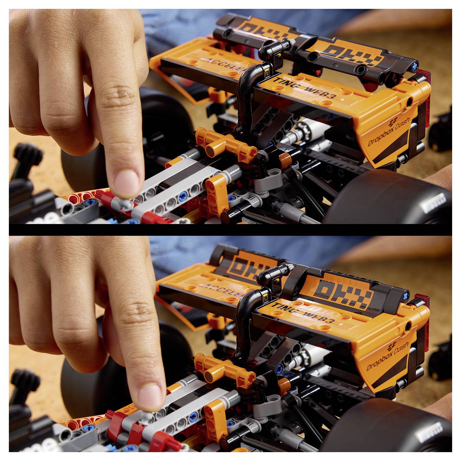 Ein Finger zeigt auf den verstellbaren Spoiler eines detaillierten orangefarbenen Rennwagenmodells und zeigt dessen Mechanik und Designmerkmale.