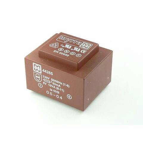 Brown electronic transformer with specifications labeled on top, including voltage, current, and certification information.