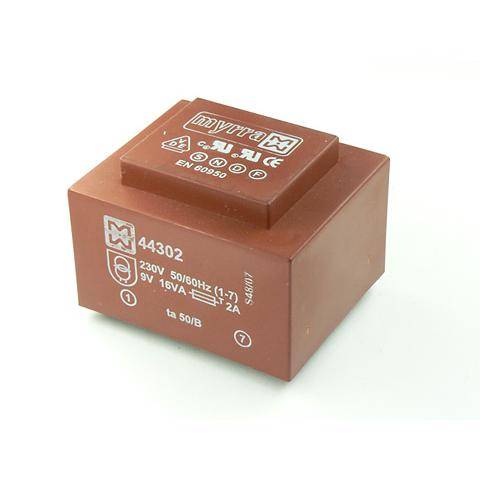 A small, brown electrical transformer labeled 'myrra 44302', featuring voltage ratings and certification marks on its surface.