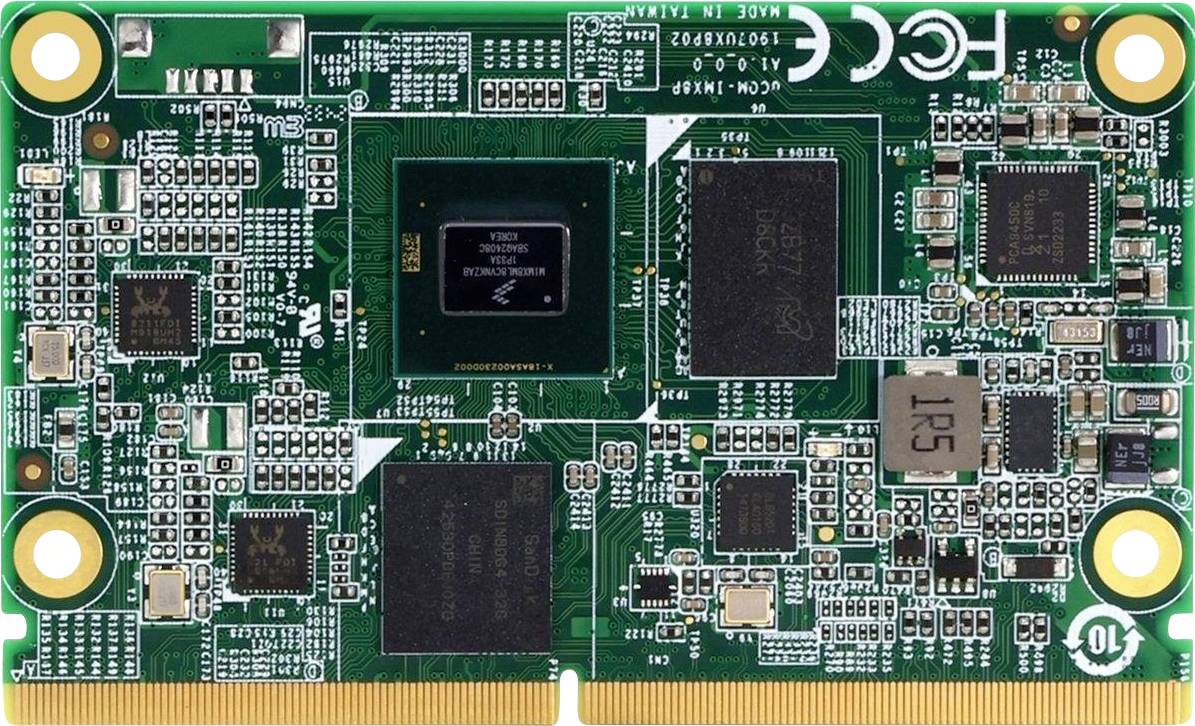 Eine grüne Leiterplatte mit verschiedenen Mikrochips, Steckern und Komponenten, die für Datenverarbeitung oder elektronische Anwendungen verwendet wird.