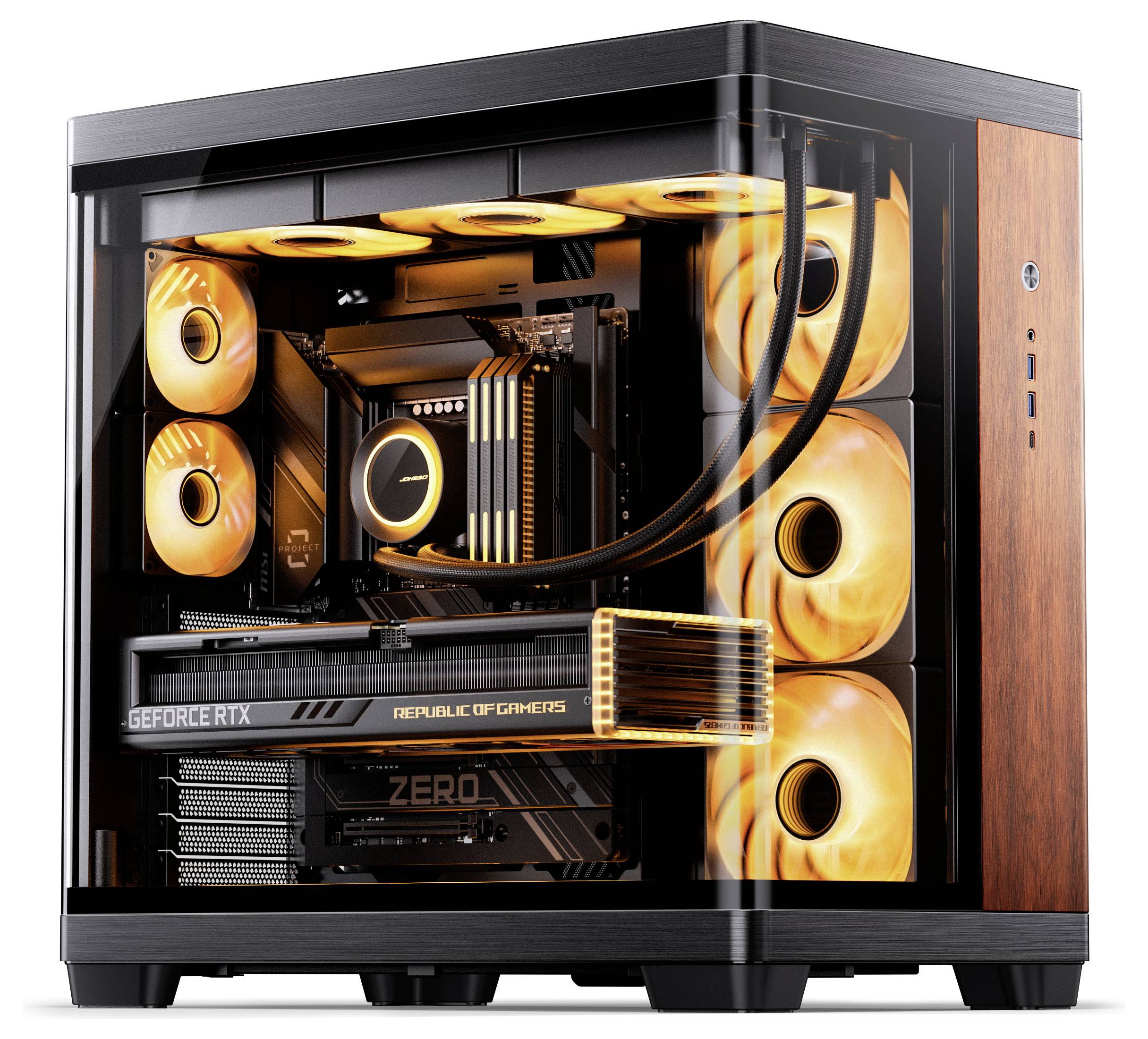 Ein Gaming-PC mit orangefarbenen LED-Lüftern, einer sichtbaren Grafikkarte mit der Bezeichnung „GeForce RTX