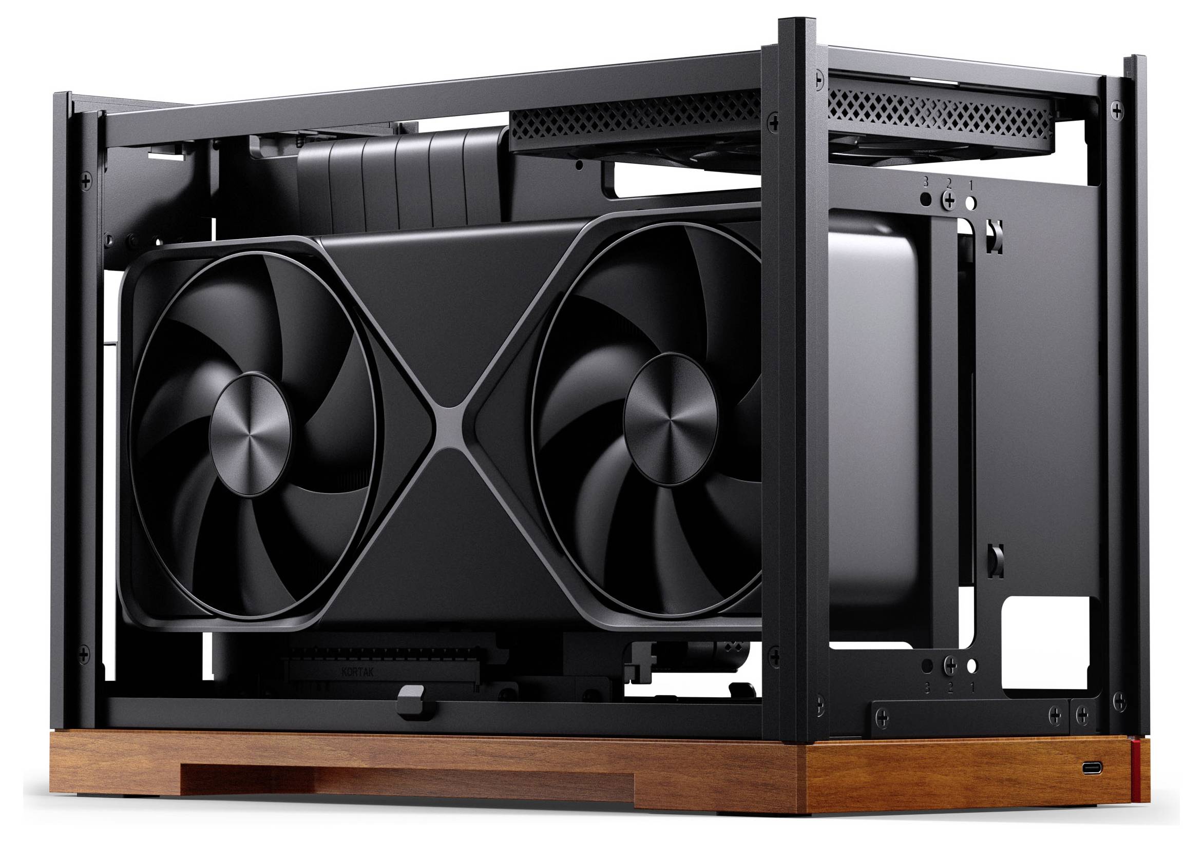 „Kompaktes Computergehäuse mit Dual-Fan-Grafikkarte, offenes Rahmendesign und Holzsockel, das ein modernes Hardware-Setup präsentiert.