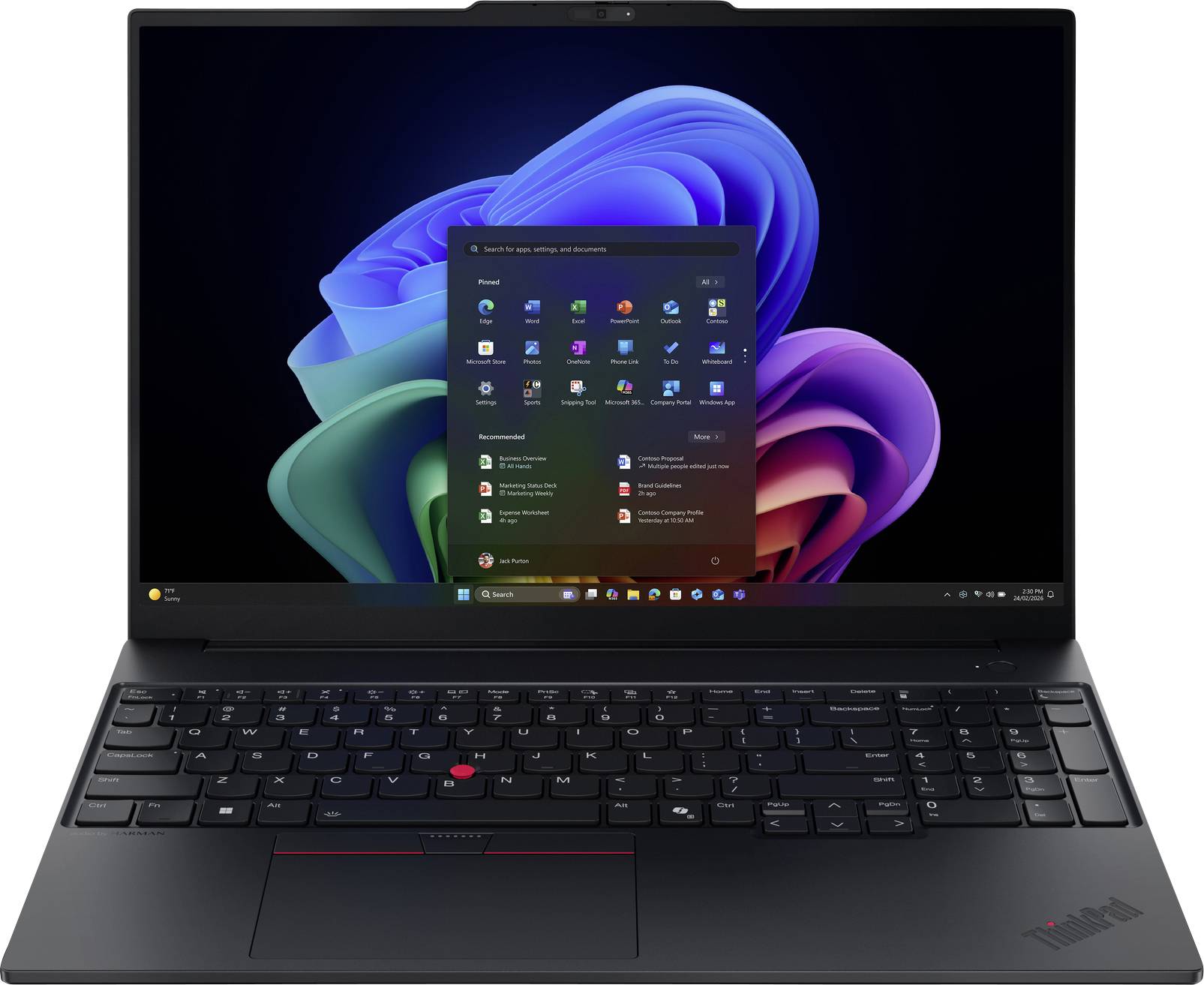 Ein schwarzer Laptop mit dem Windows 11-Startmenü auf dem Bildschirm, mit buntem abstraktem Hintergrundkunstwerk.