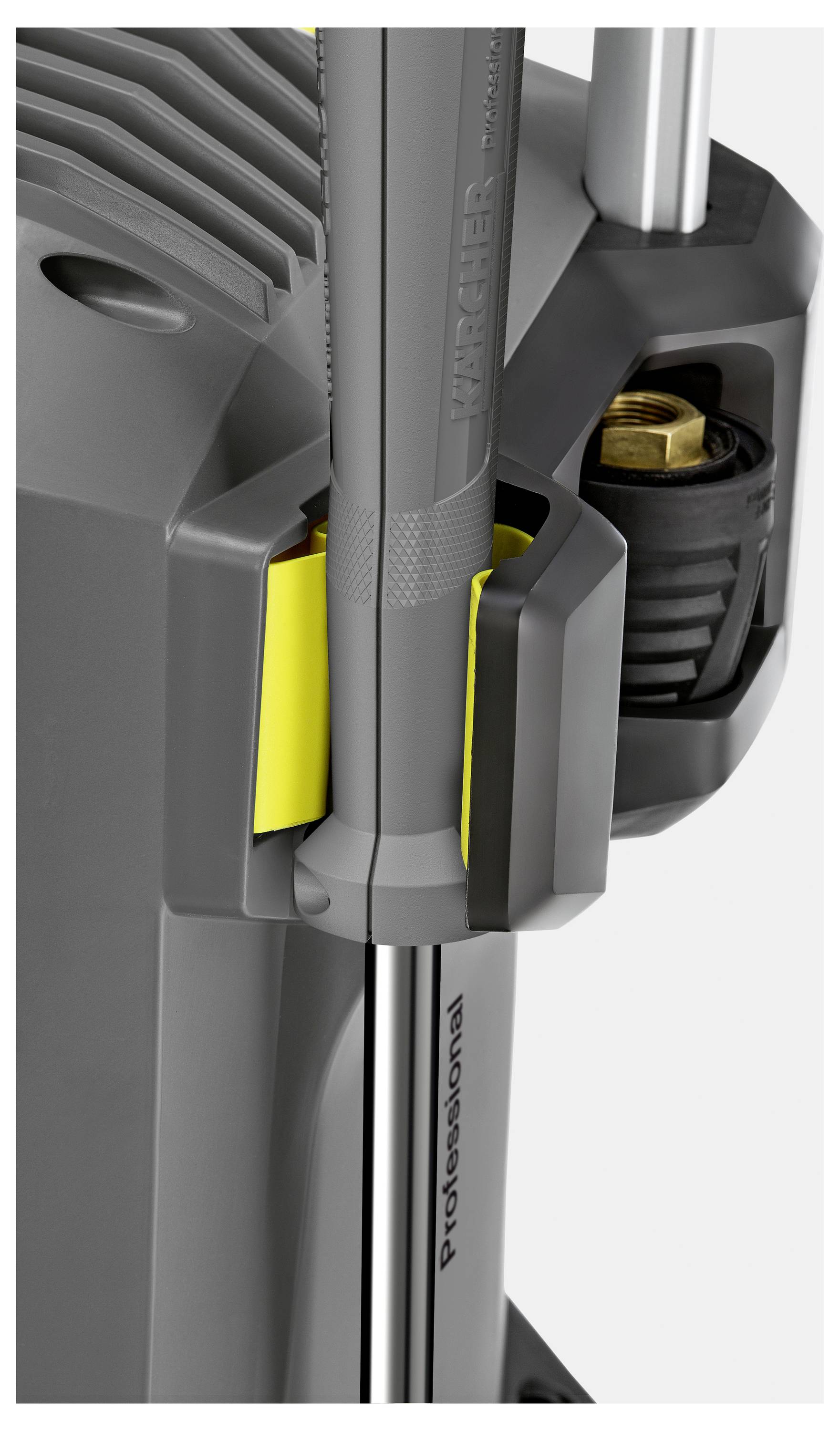 Nahaufnahme eines grau und schwarz gefärbten professionellen Hochdruckreinigers, der einen Teil der Maschine mit einer prominenten gelben Betätigungstaste zeigt.