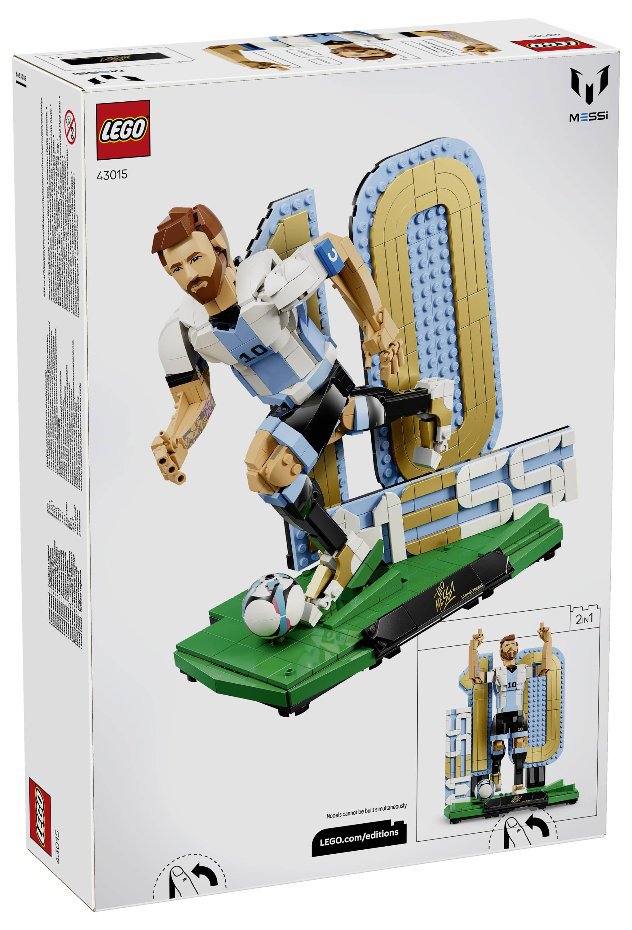 LEGO Messi-Anzeigeset mit einer Schachtel, die einen fußballthematischen Bau von Lionel Messi auf einem grünen Platz mit Tor-Kulisse zeigt, gekennzeichnet mit 43015 und 2 in 1.