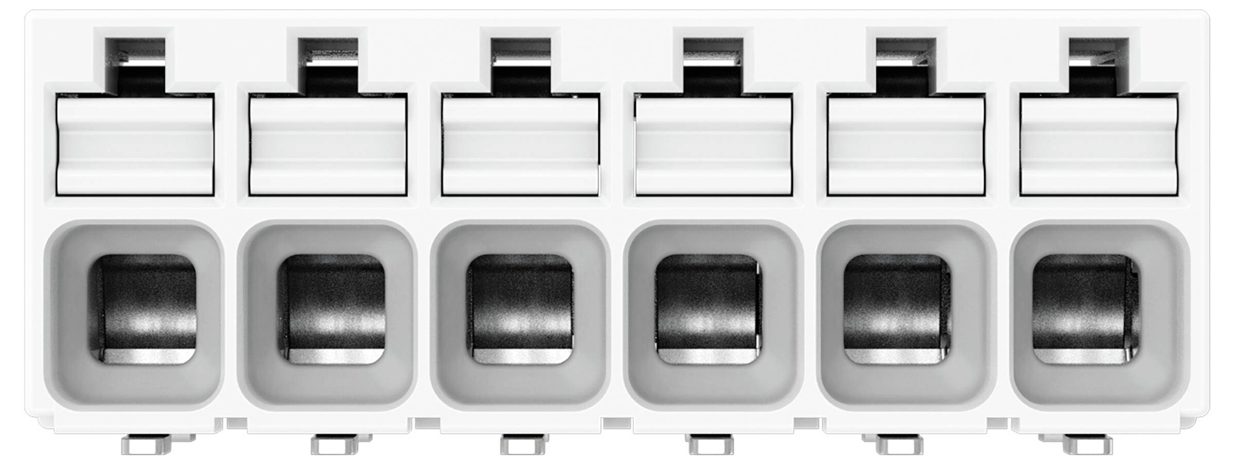 Eine Reihe von sechs weißen Anschlussblöcken mit offenen Schlitzen, die Metallkontakte im Inneren aufweisen und für elektrische Verbindungen verwendet werden.