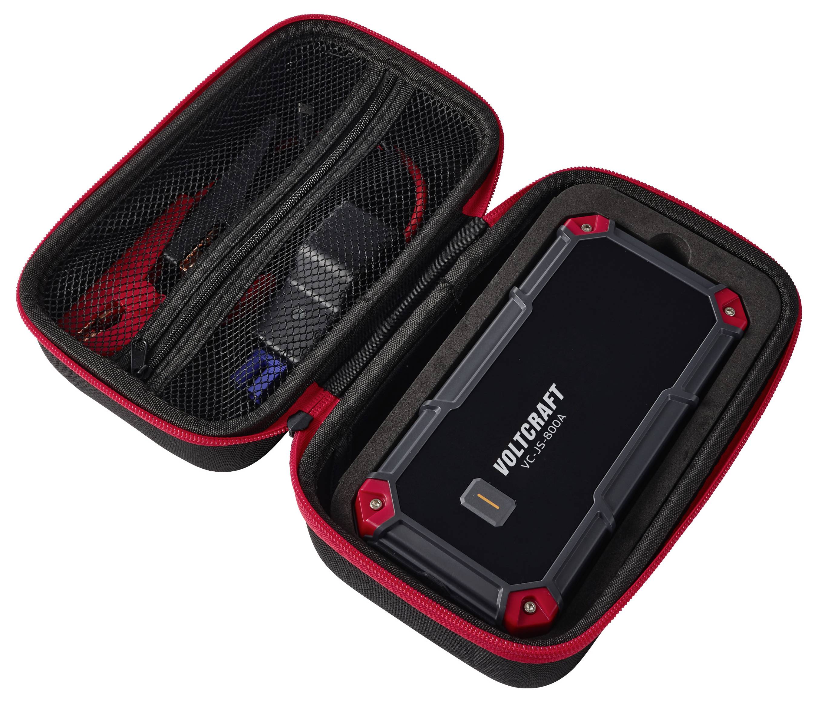 Offener Transportkoffer mit einem robusten VOLTCRAFT-Gerät, Kabeln und Zubehör in einer Netzgewebe-Tasche.